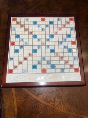 Scrabble Classic Game Board with Dark Red Frame on Turntable